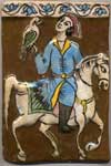 A Persian tile showing a mounted falconer.